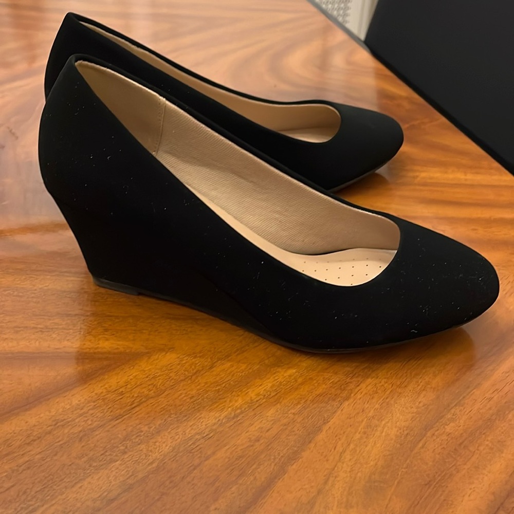 Black size 8 heels. Never worn